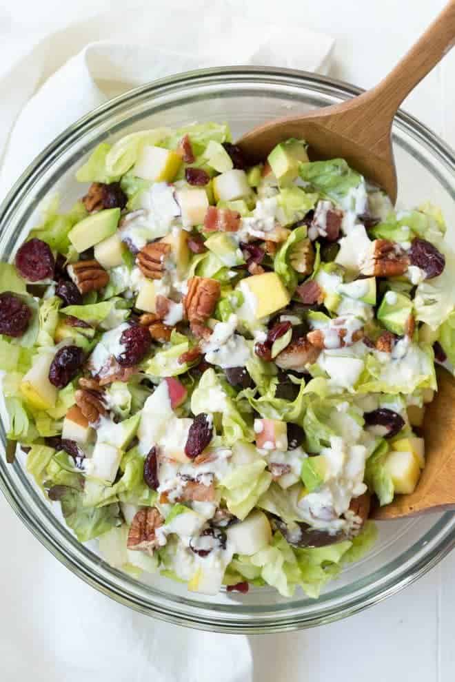 Autumn Chopped Salad is made with the freshest fall flavors including apples, pears, cranberries, bacon, avocado, butter greens and a creamy white cheddar dressing! #apple #pear #autumn #fall #salad #healthy #organicgirl #greens #fall #mealprep