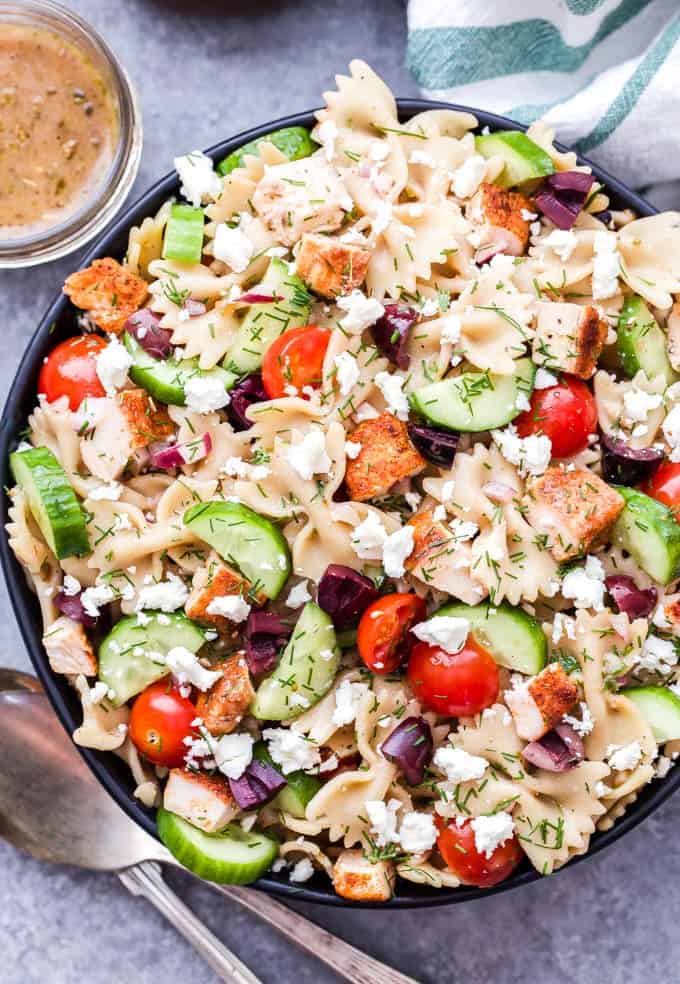 green chicken pasta salad in a large bowl for serving