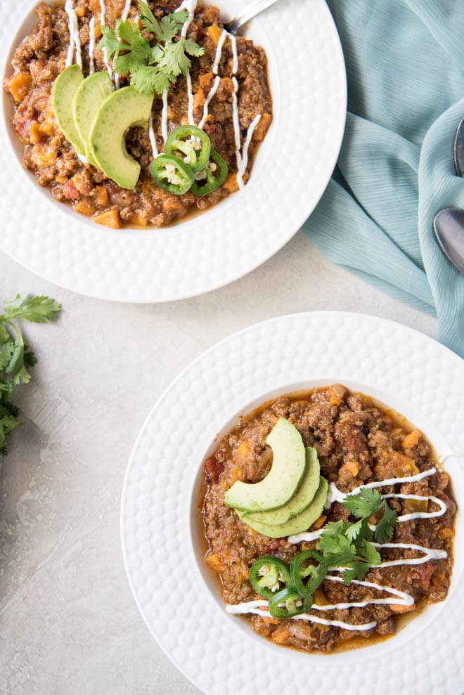 Turkey Sweet Potato Chili is a healthier take on your favorite hearty chili! This is a fall favorite that the whole family will love and it cooks in the Instant Pot for an easy weeknight dinner. #turkey #chili #sweetpotato #instantpot #pressurecooker #dinner #recipe #healthy