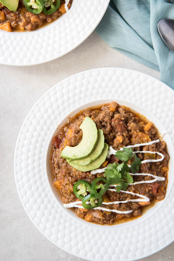 Turkey Sweet Potato Chili is a healthier take on your favorite hearty chili! This is a fall favorite that the whole family will love and it cooks in the Instant Pot for an easy weeknight dinner. #turkey #chili #sweetpotato #instantpot #pressurecooker #dinner #recipe 