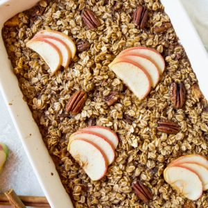 A large casserole dish filled with apple cinnamon baked oatmeal