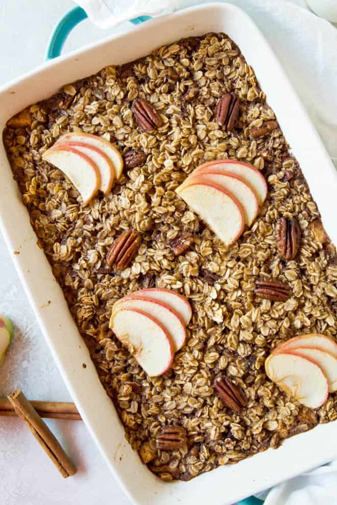 A large casserole dish filled with apple cinnamon baked oatmeal