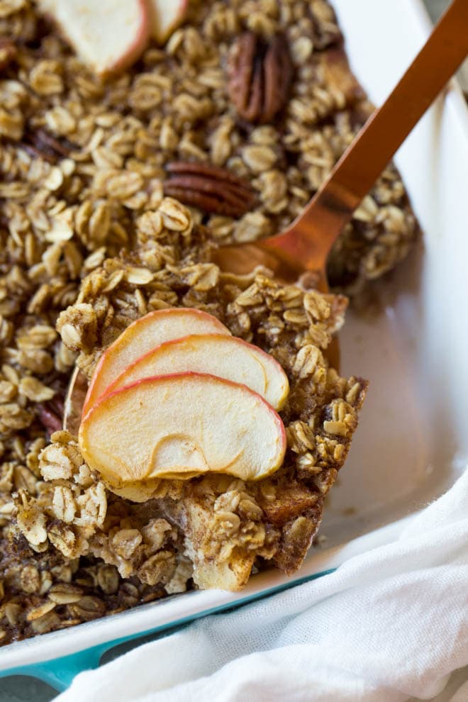 A scoop of baked oatmeal with apples.