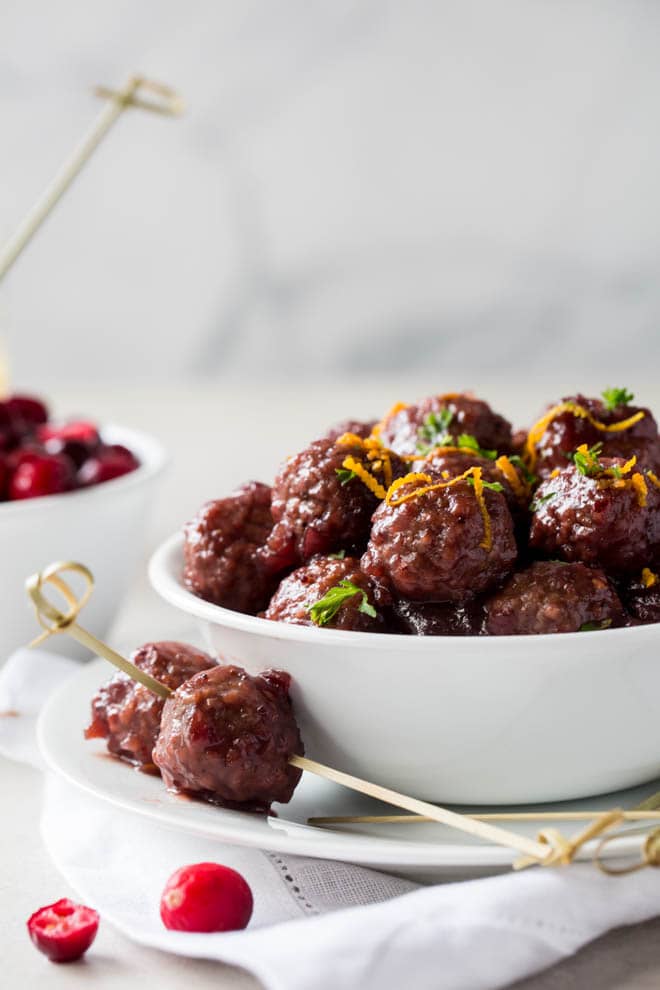 Combine only five ingredients together in the slow cooker to make these Crockpot Meatballs with Cranberry Sauce and Orange! Packed with fresh flavor, these meatballs are an easy appetizer for holiday parties or potluck dinners. #cranberry #orange #slowcooker #crockpot #meatballs