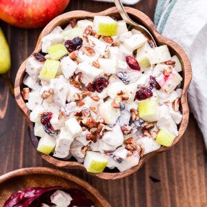 Harvest Chicken Salad is perfect for when you're craving a lighter, healthier meal this fall. Loaded with apples, pears, dried cranberries, pecans and a creamy, tangy Greek yogurt dressing. #chickensalad #fallrecipe #healthydinner #chicken #greekyogurt