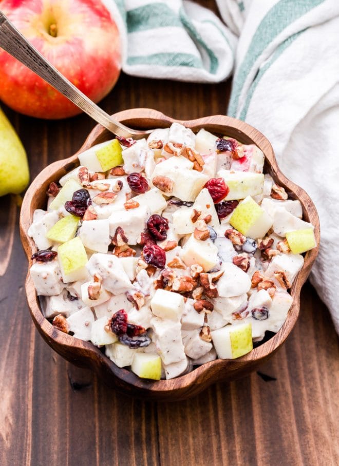 Harvest Chicken Salad is perfect for when you're craving a lighter, healthier meal this fall. Loaded with apples, pears, dried cranberries, pecans and a creamy, tangy Greek yogurt dressing. #chickensalad #fallrecipe #healthydinner #chicken #greekyogurt