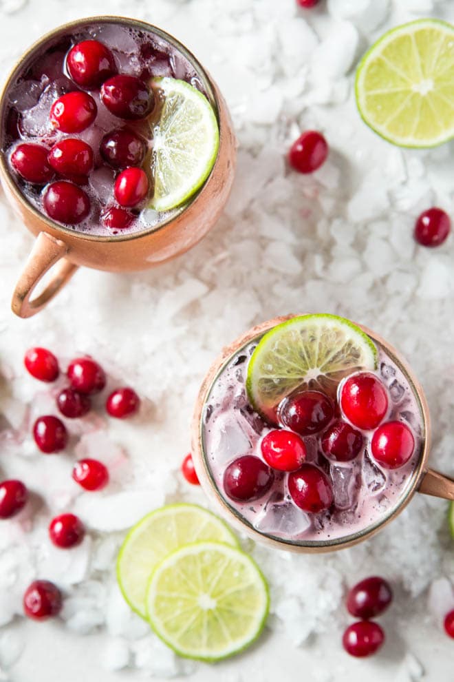 Shake up a Cranberry Moscow Mule and serve this festive holiday cocktail at your next dinner party or holiday celebration! #cranberry #moscow #mule #drink #recipe #holiday