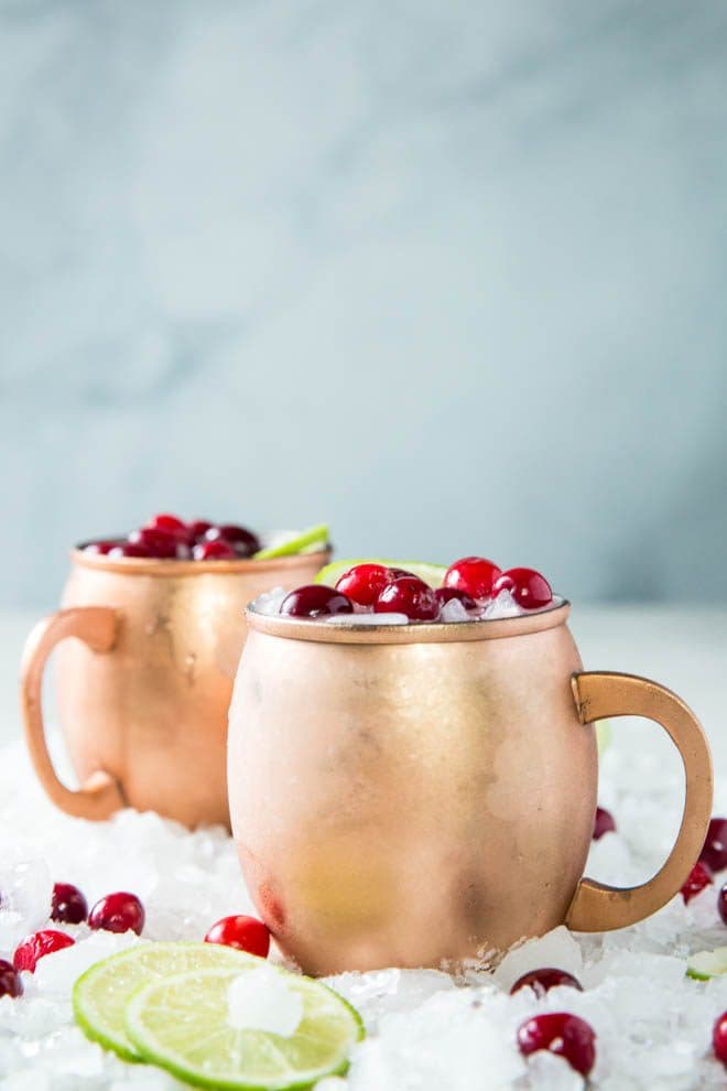 Shake up a Cranberry Moscow Mule and serve this festive holiday cocktail at your next dinner party or holiday celebration! #cranberry #moscow #mule #drink #recipe #cocktail