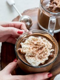 Homemade hot chocolate is the perfect sweet treat and drink to celebrate the holidays! This recipe cooks in the Instant Pot or Slow Cooker to make things easy for holiday entertaining. #instantpot #slowcooker #homemade #hotchocolate #recipe