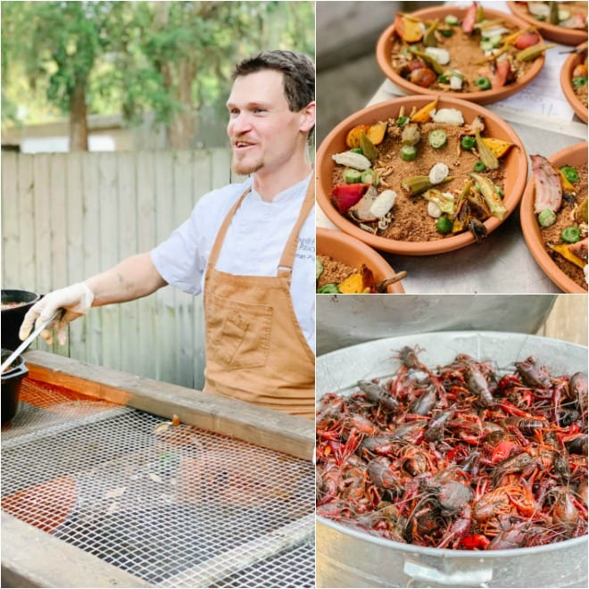 crawfish in a large tub with a chef cooking at the grill