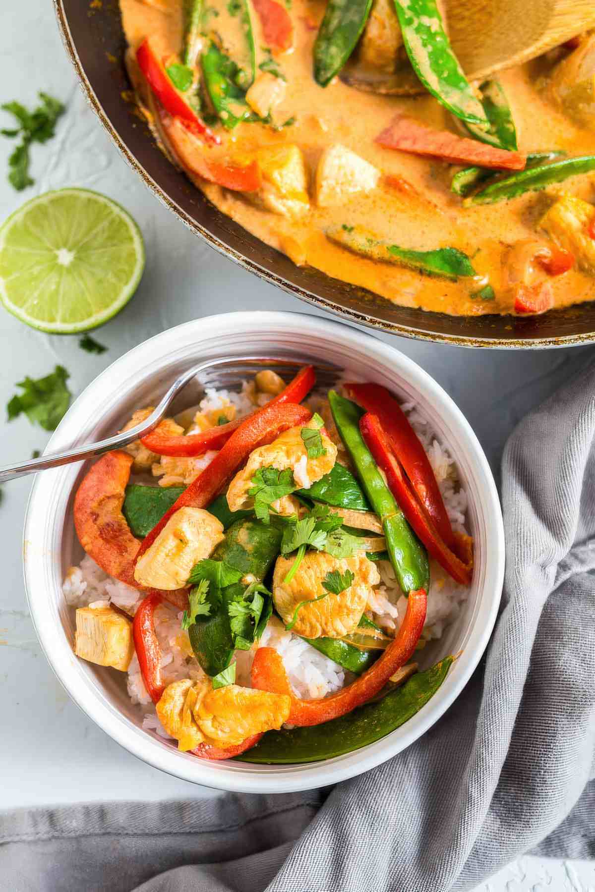 Easy coconut chicken curry served over rice with vegetables and creamy curry sauce