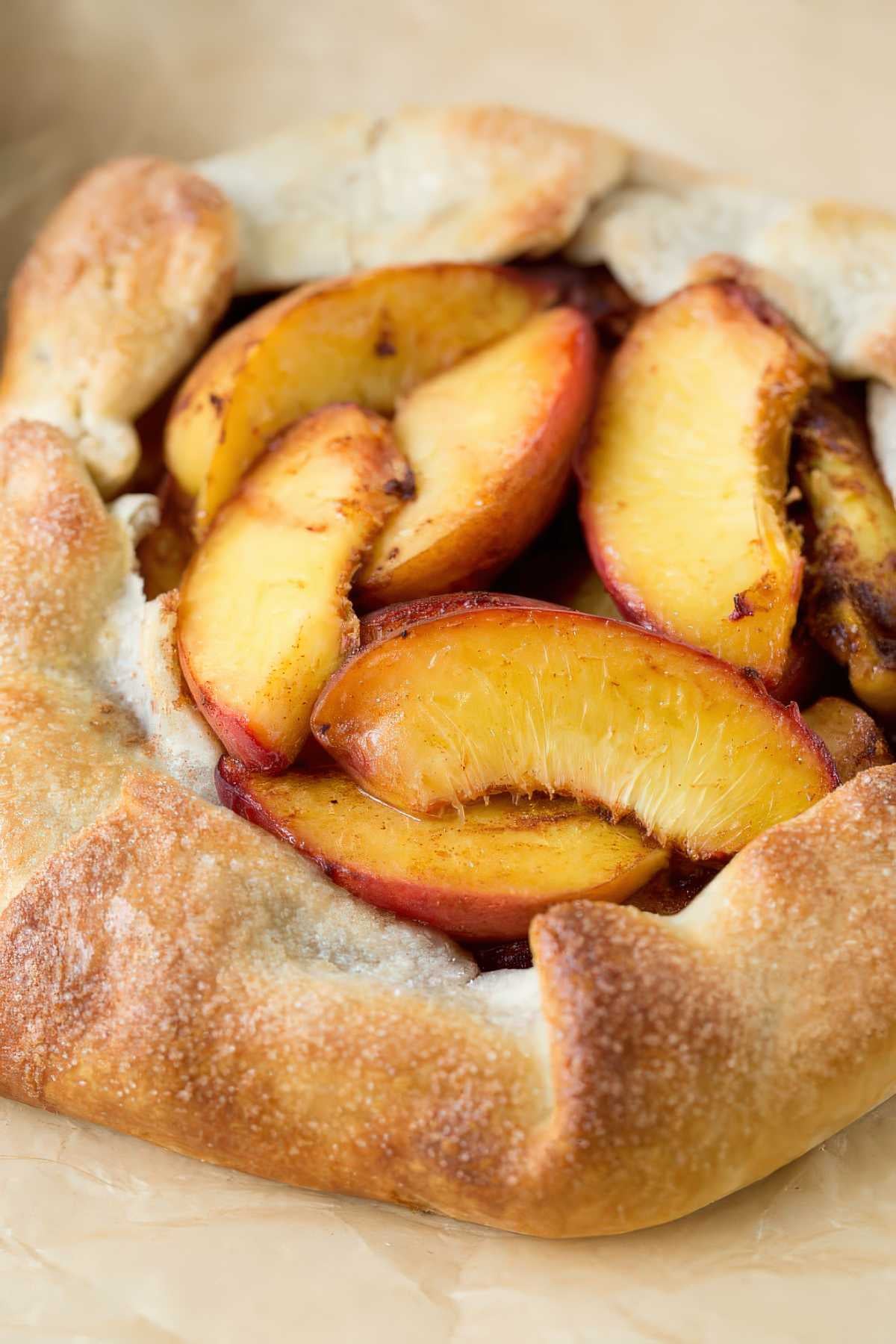 Peach crostata with fresh sliced peaches baked in a rustic golden crust