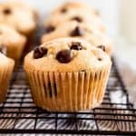 chocolate chip muffins on a baking rack