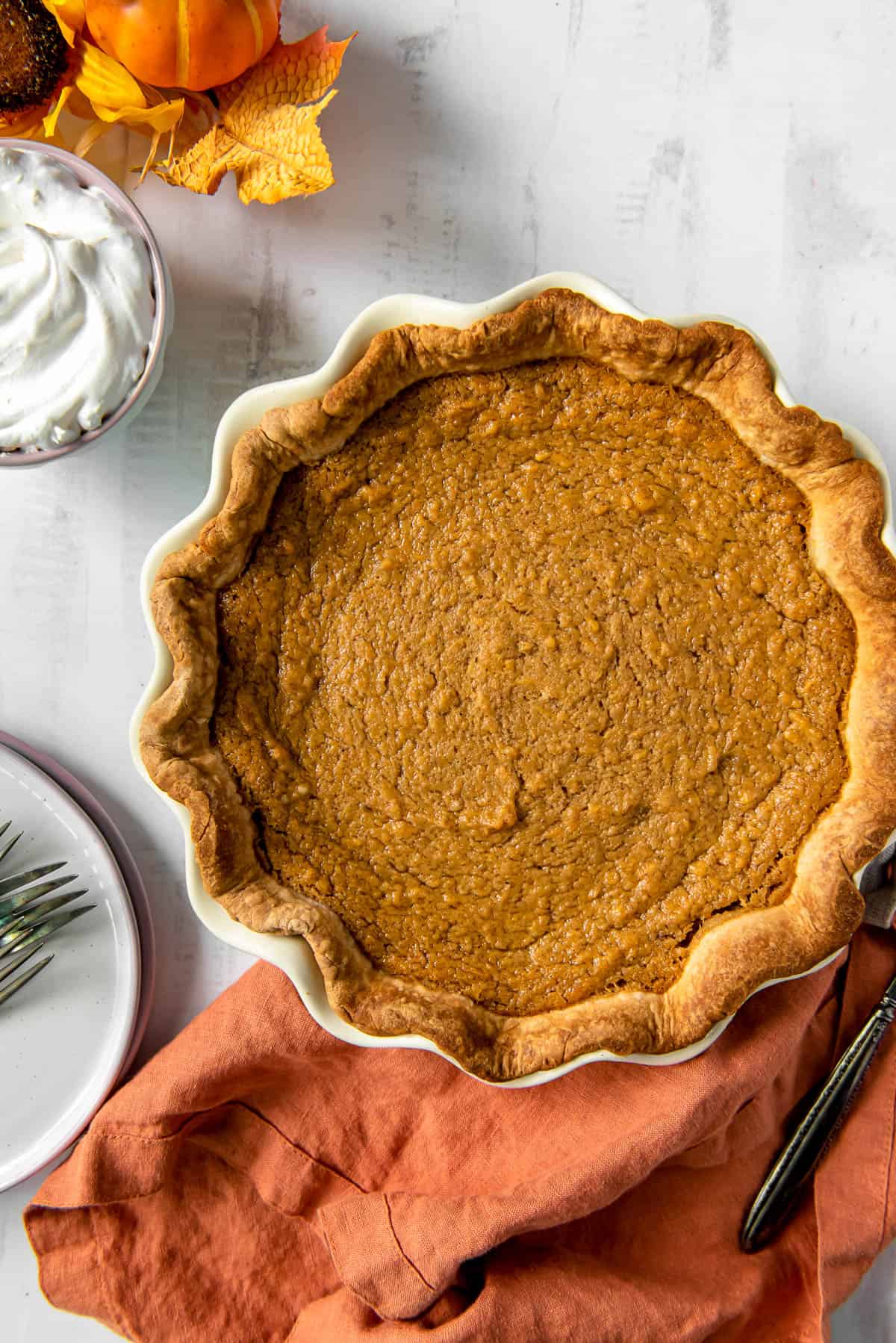 a whole southern sweet potato pie sitting on a table
