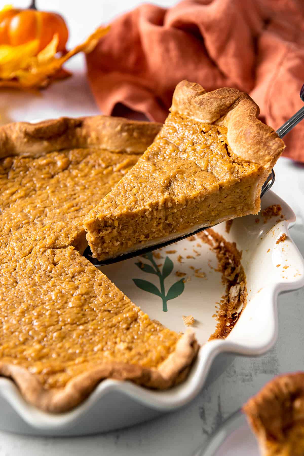 taking a slice out of a southern sweet potato pie