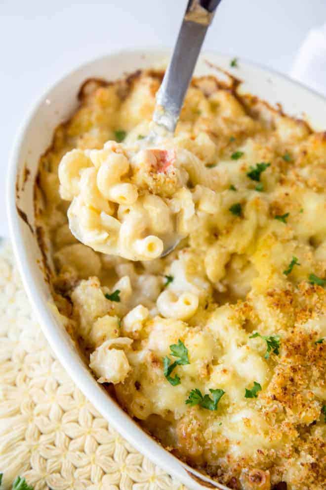 homemade baked lobster mac and cheese in a casserole dish