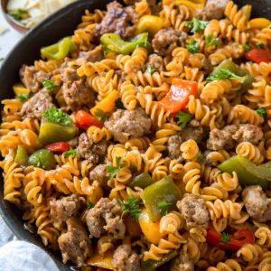 skillet with sausage, peppers, fusilli pasta