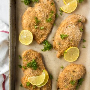 baked chicken cutlets on a sheet pan