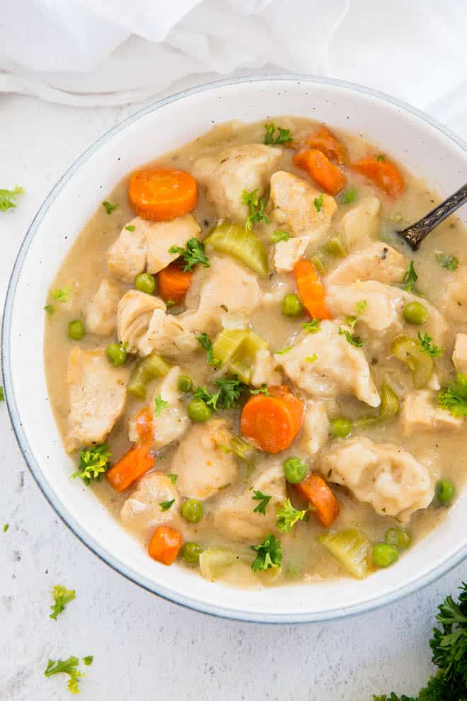 homemade chicken and dumpling soup in a bowl