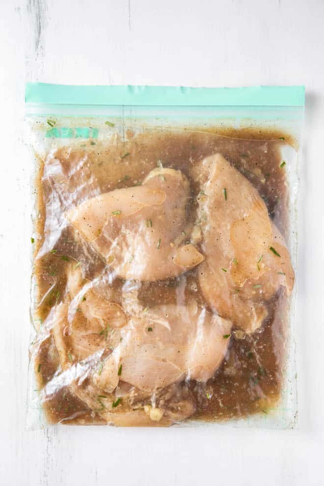 chicken cutlets in a ziploc bag with simple chicken marinade