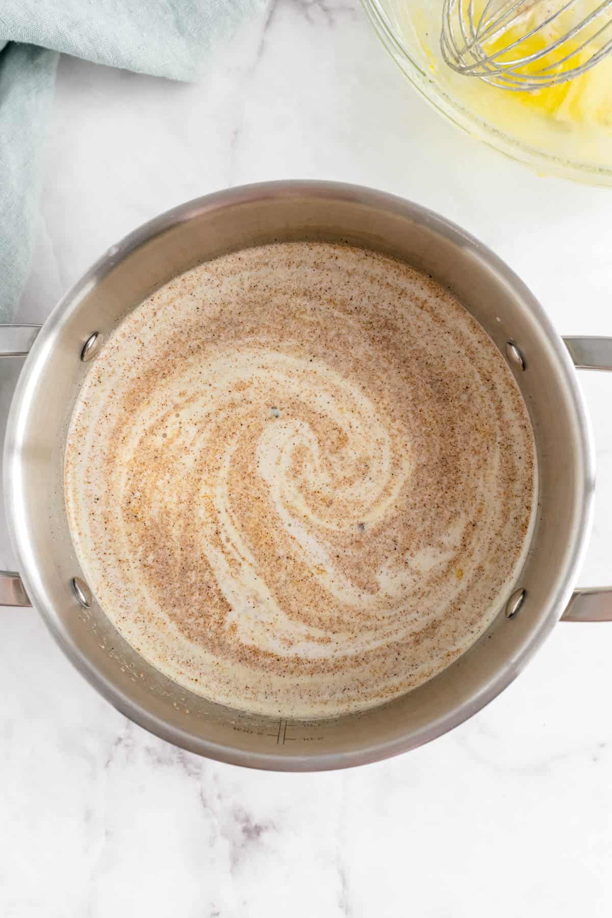 eggnog mixed together in a large pan