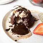 a bite taken out of a chocolate molten lava cake