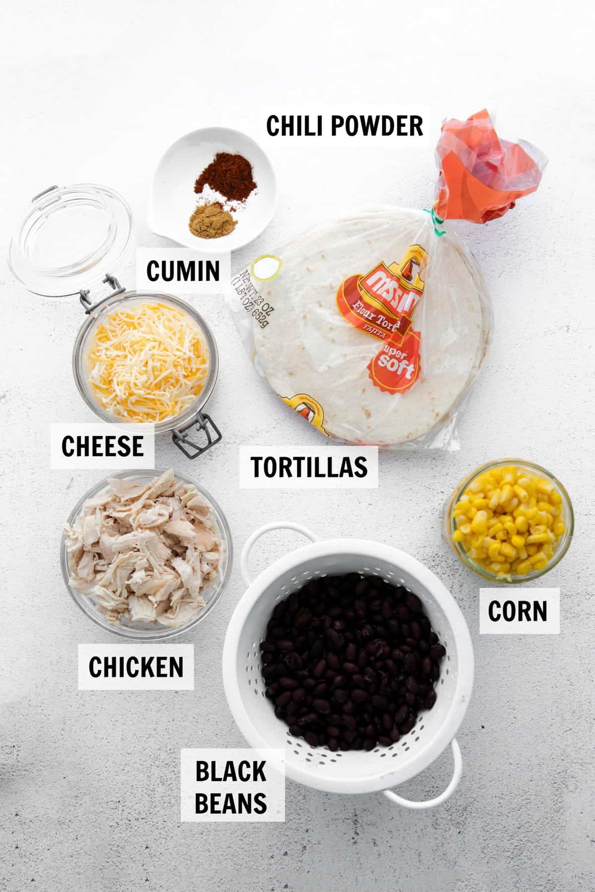 ingredients for quesadillas on white tabletop