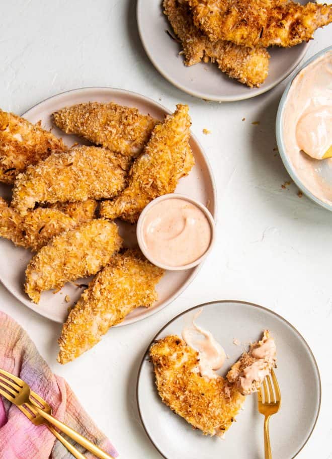 chicken tenders sitting on a plate
