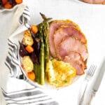 ham, vegetables, and potatoes on a plate