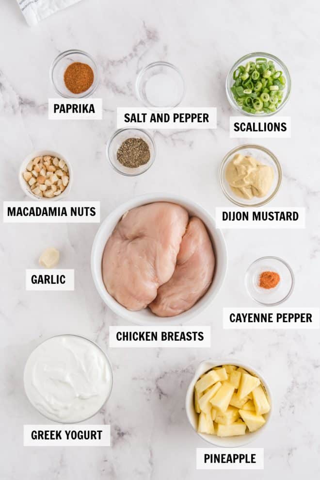 ingredients for hawaiian chicken salad on a white countertop