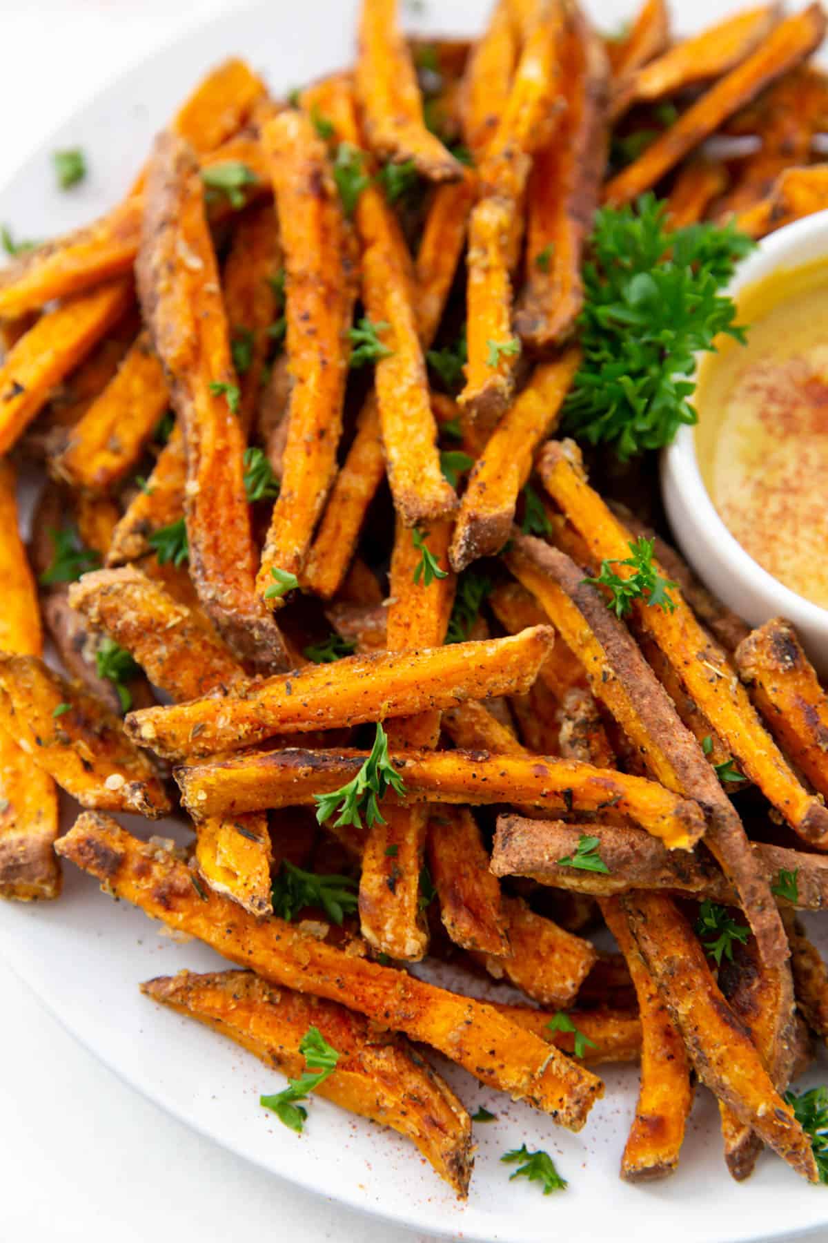 baked sweet potato fries on a plate