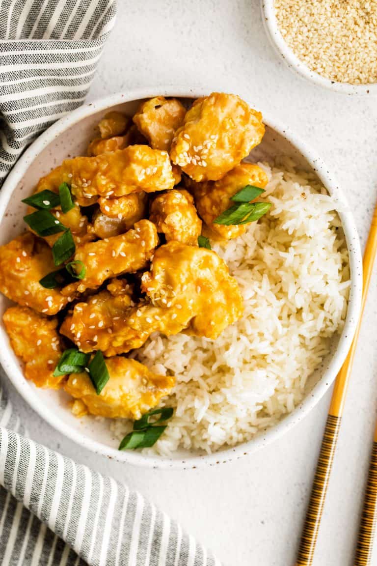 air fryer orange chicken with rice on a plate
