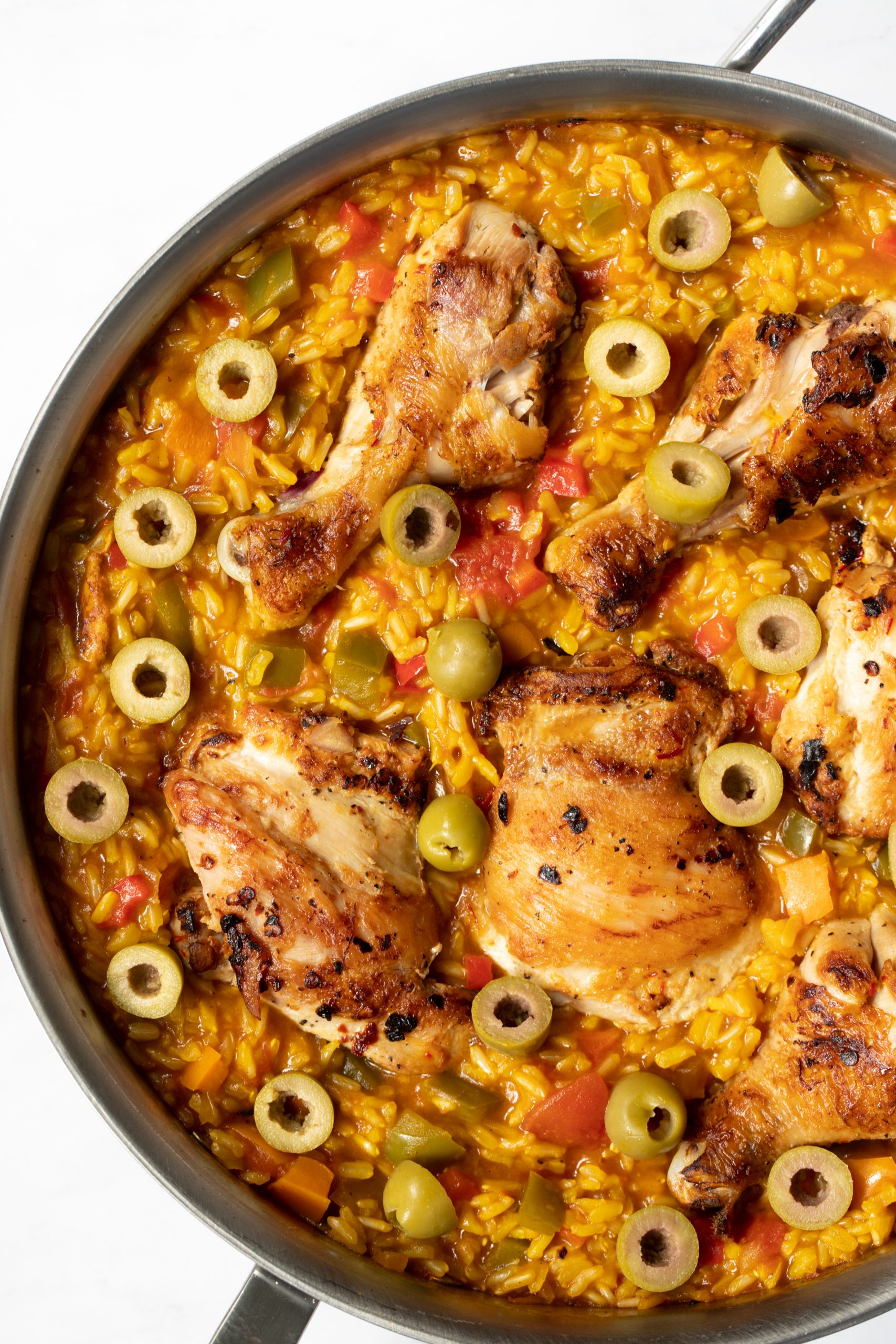 spanish chicken and rice in a skillet