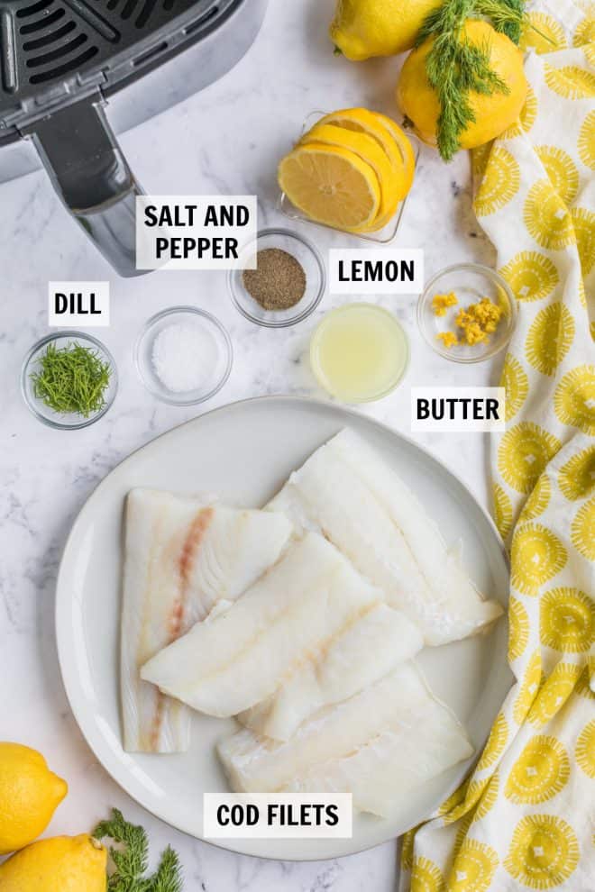 ingredients for air fryer lemon cod on a white tabletop
