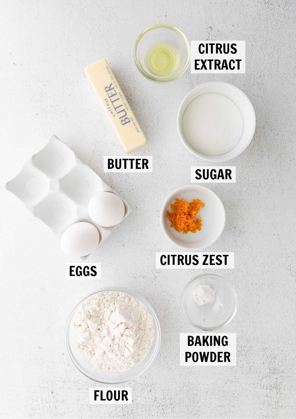 ingredients for madeleine cookies on a tabletop
