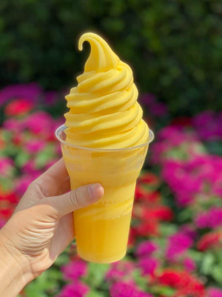 dole whip in front of flower bed
