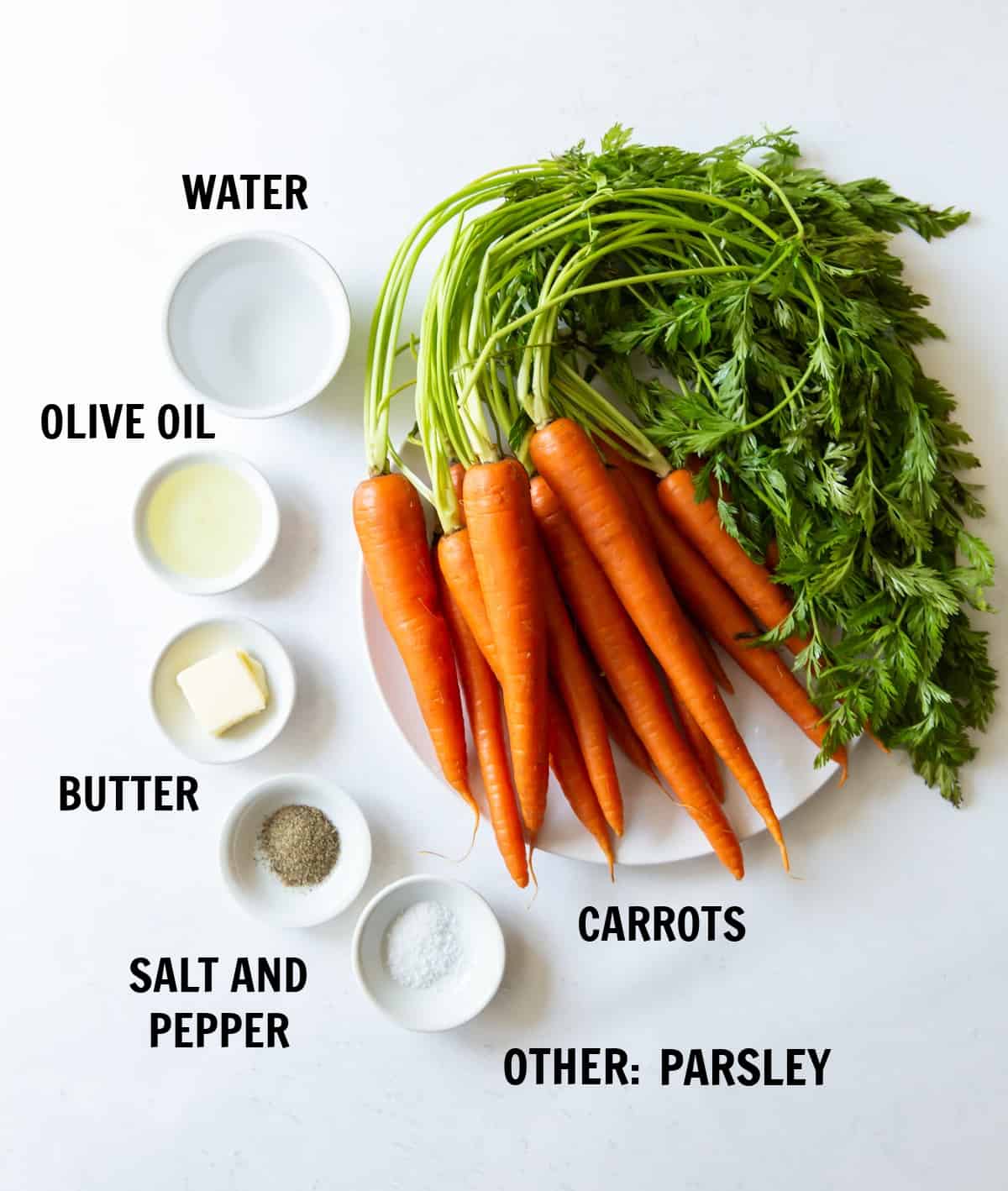 Sauteed carrots ingredients measured out into white dishes