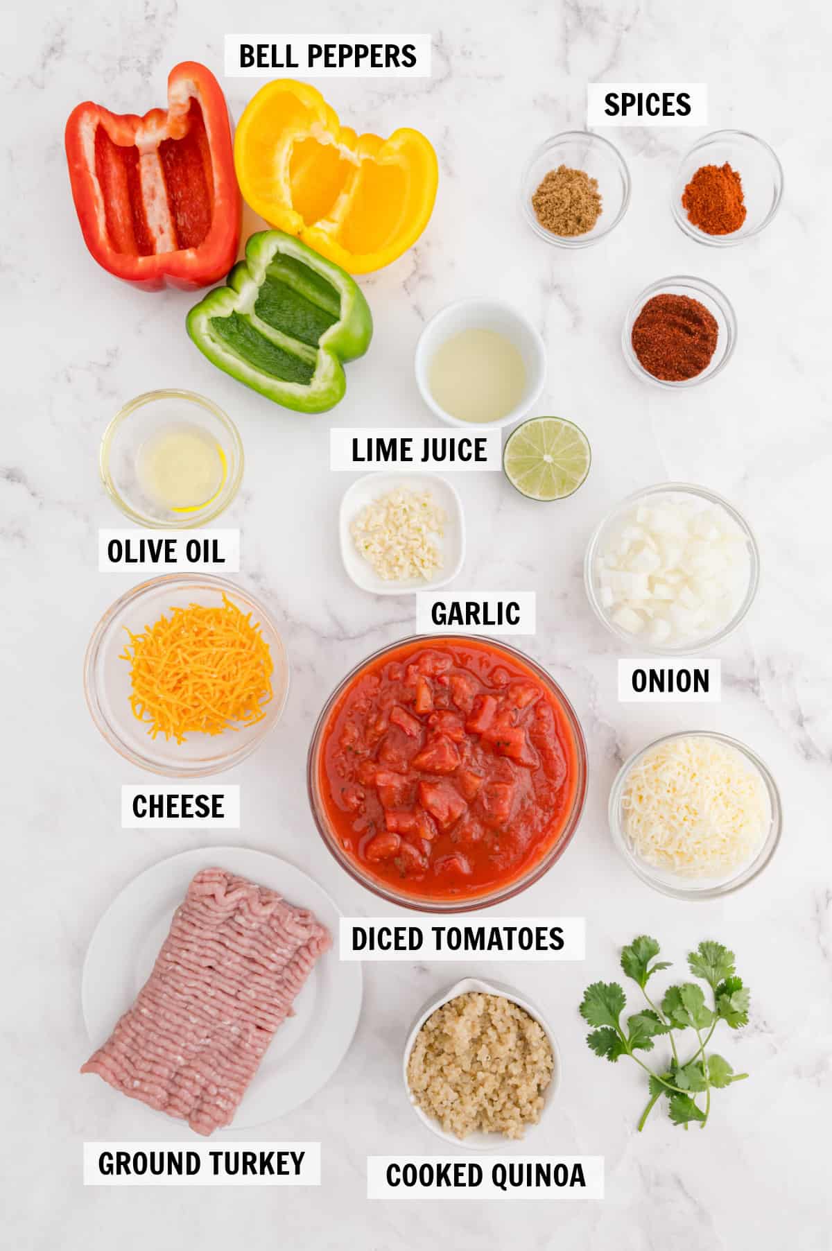 all of the ingredients for stuffed peppers on a tabletop