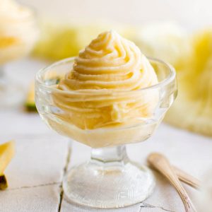 homemade pineapple dole whip in a glass on a table