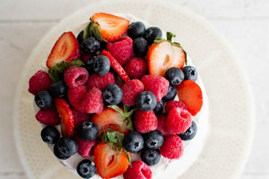 cake topped with fresh berries