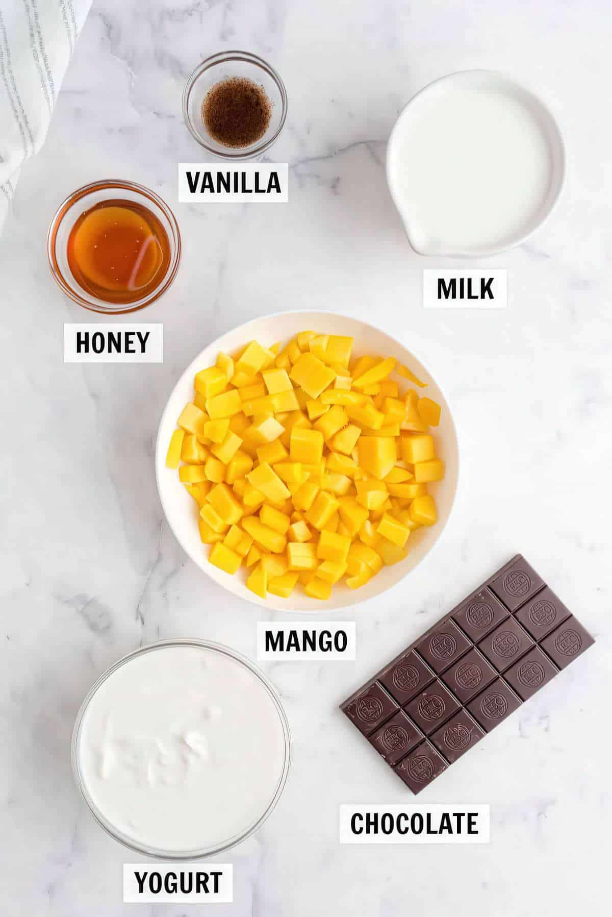 mango yogurt honey milk vanilla and chocolate for mango popsicles