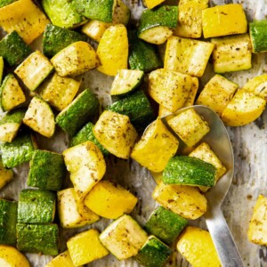 roasted zucchini and squash on a baking sheet