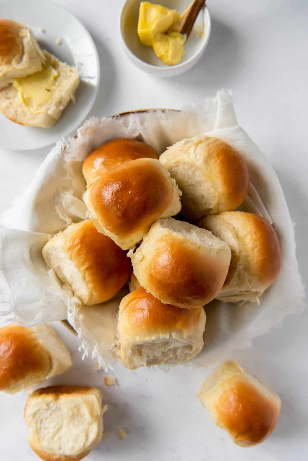 all of the dinner rolls in a large bowl for serving