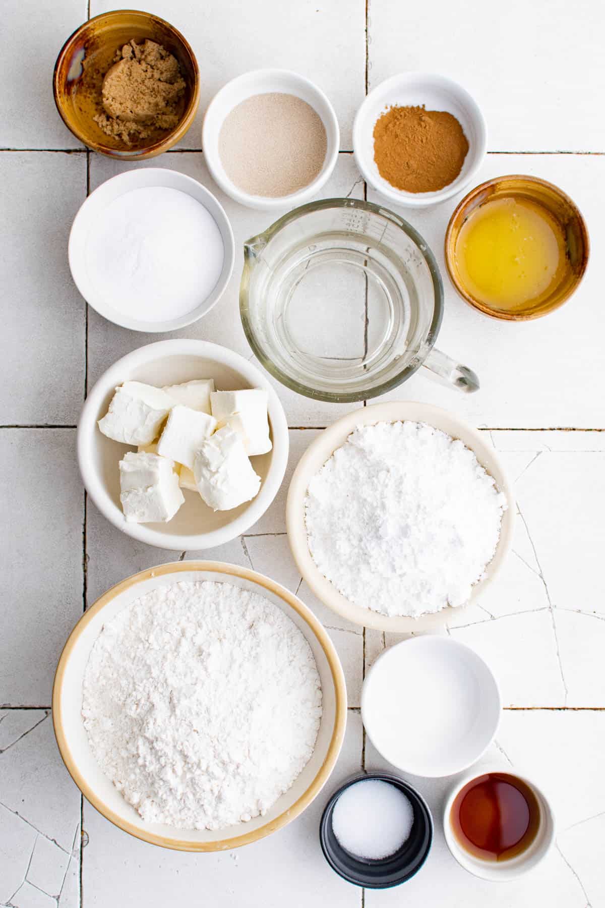 all of the ingredients for stuffed pretzels on a white countertop