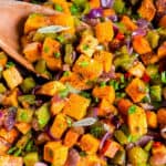 a skillet filled with cooked sweet potato hash