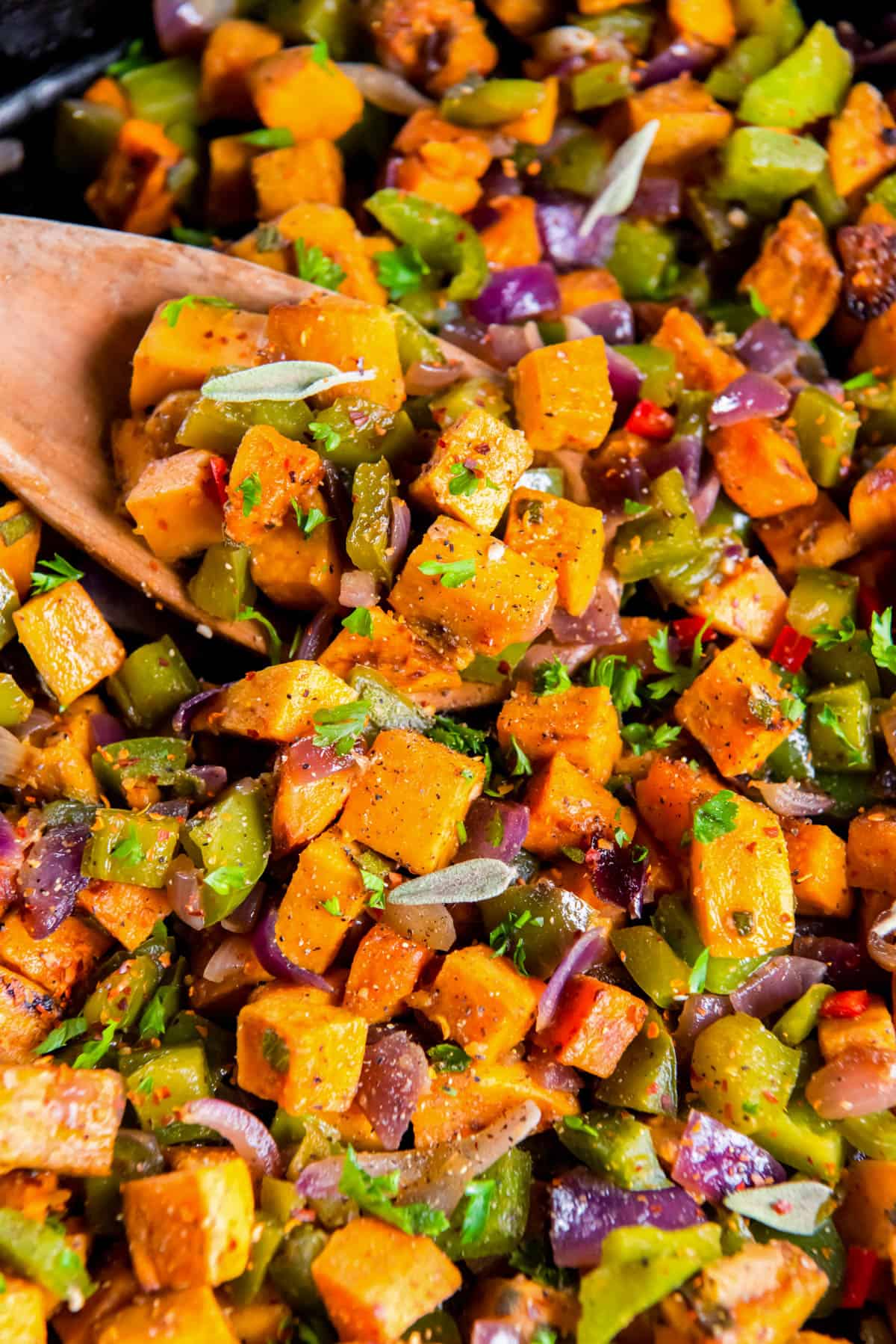 a skillet filled with cooked sweet potato hash