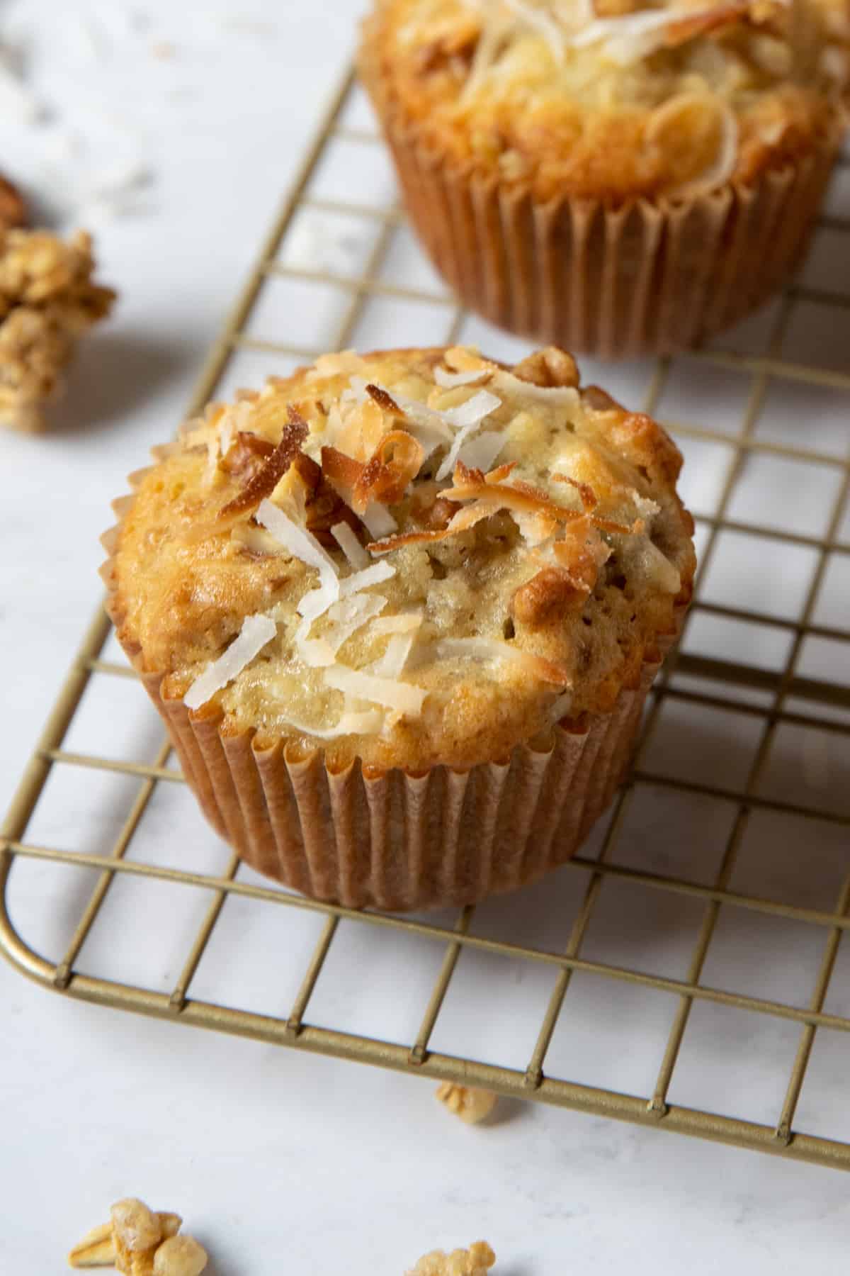 close up photo of one banana coconut muffin