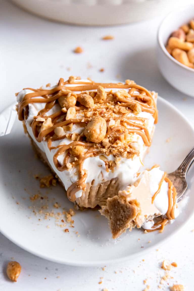 one slice of peanut butter pie with a fork in it