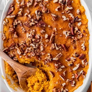 sweet potato souffle with pecans sprinkled on top