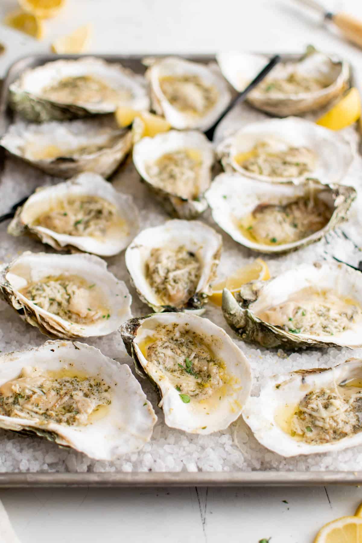 baked oysters on a rimmed baking sheet